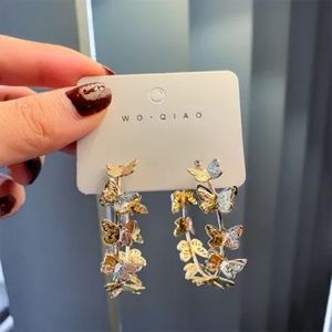 Butterfly hoop earring